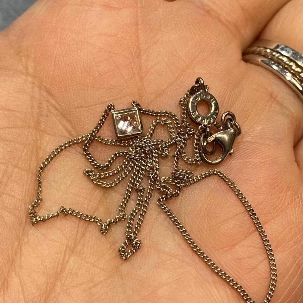 Henri Bendel sterling silver dainty chain with channel set square CZ pendant